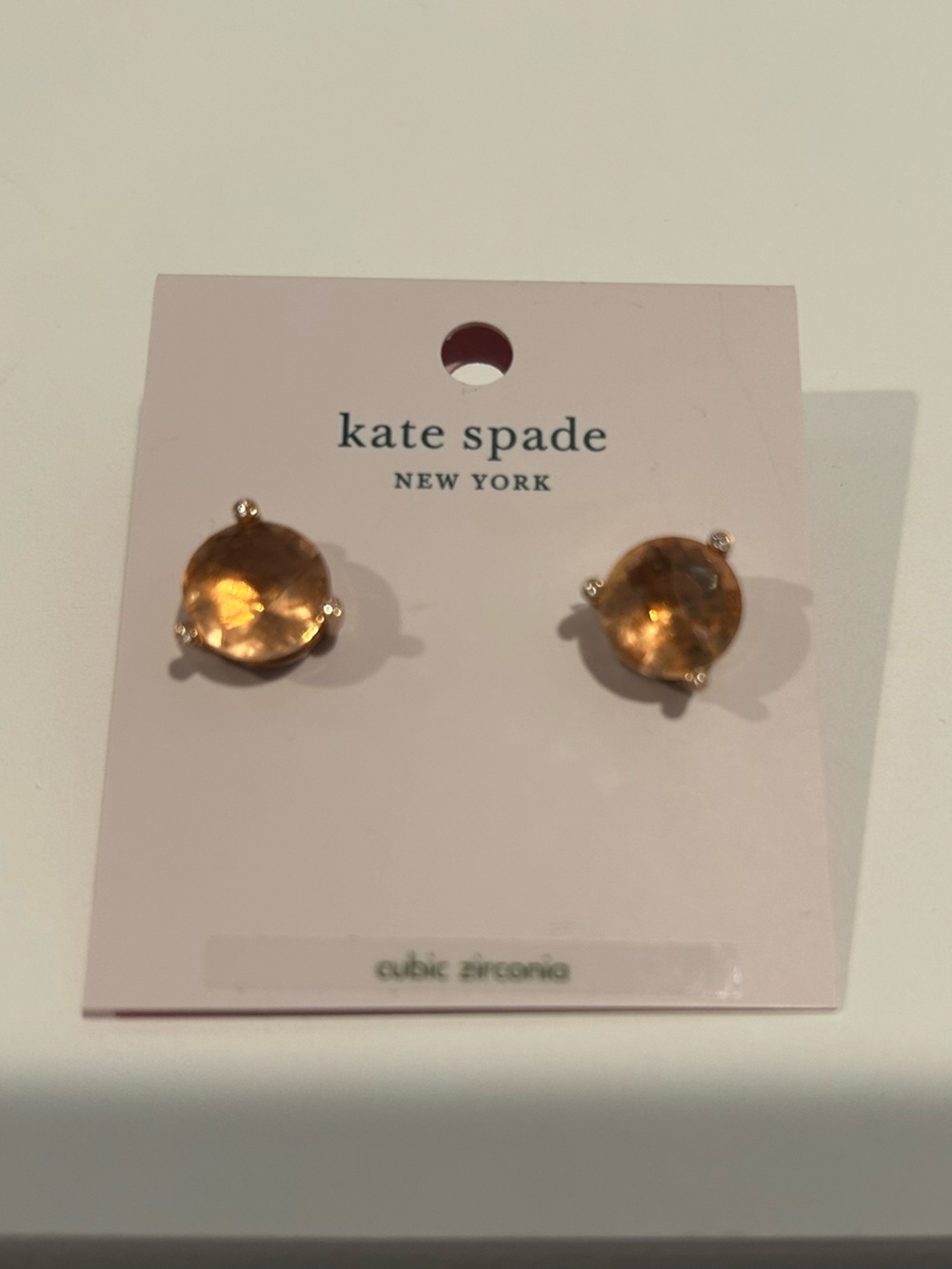 kate spade light peach Stud Earrings on Bright Pink Card